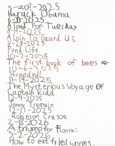 A list of books completed in a child's handwriting